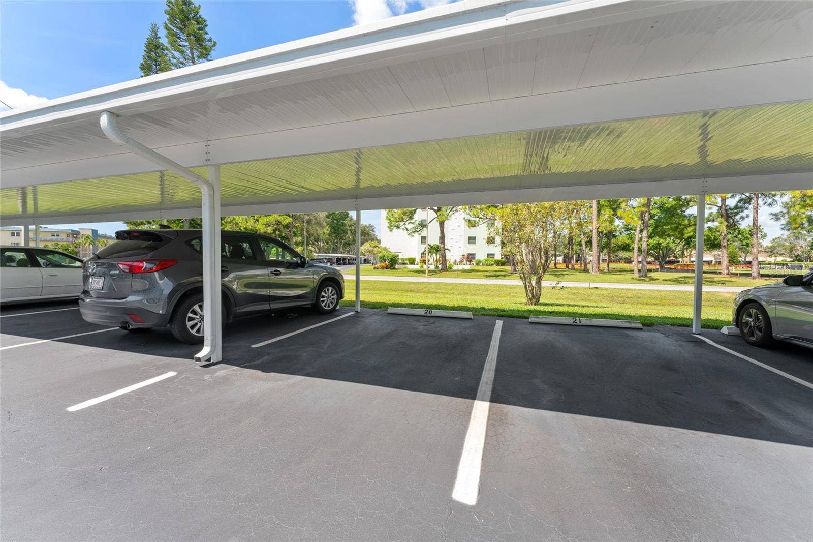 5970 80TH STREET N, #309, St Petersburg, FL 33709 carport #20 is deeded to this unit- it's very close to the elevators!