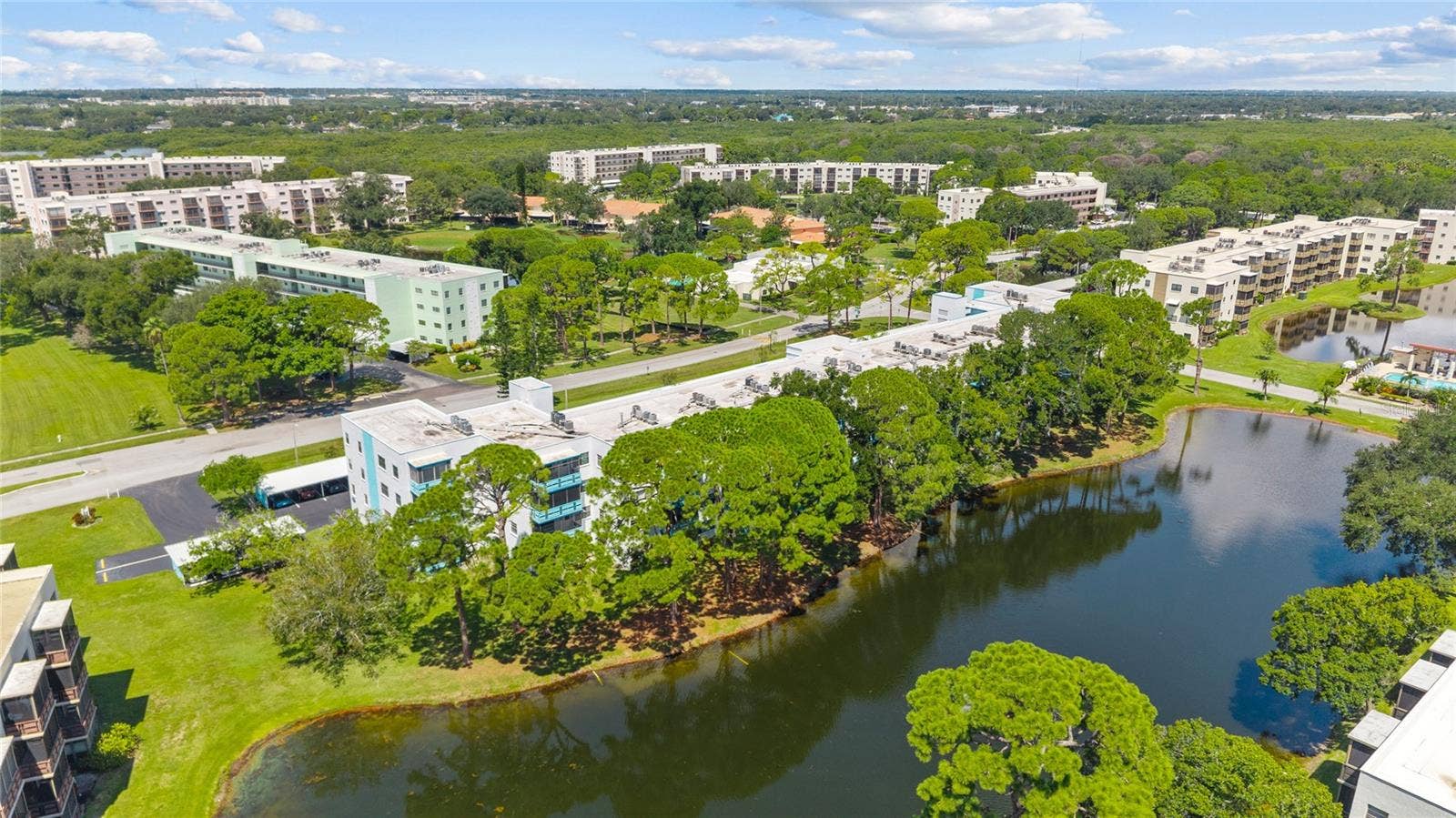 5970 80TH STREET N, #309, St Petersburg, FL 33709 Greenery and water views- bliss!