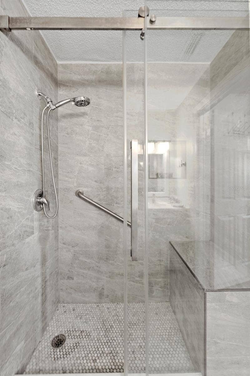 5970 80TH STREET N, #309, St Petersburg, FL 33709 The guest/hall bath shower