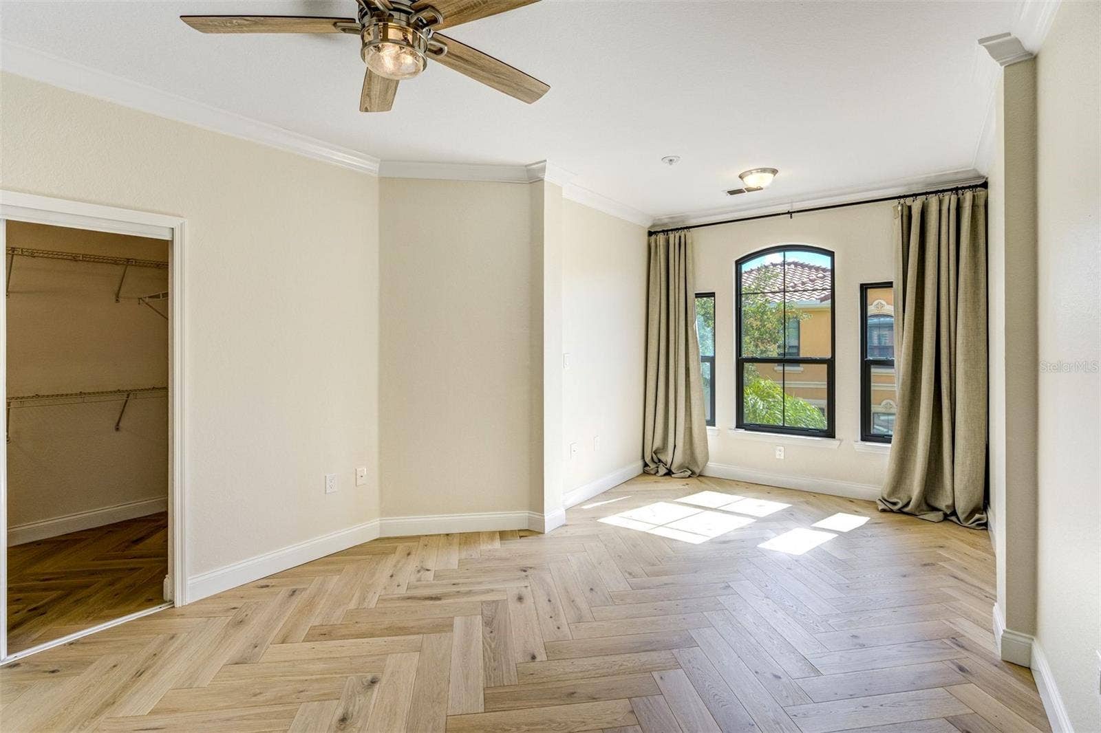2730 VIA TIVOLI, #334B, Clearwater, FL 33764 Primary bedroom with large walk in closet