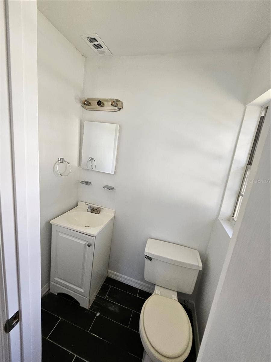 7840 BOCA CIEGA DRIVE, St Pete Beach, FL 33706 1/2 bath in primary bedroom