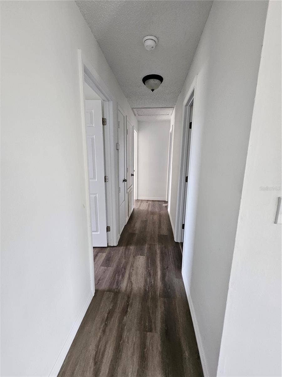7840 BOCA CIEGA DRIVE, St Pete Beach, FL 33706 hallway to other 3 bedrooms