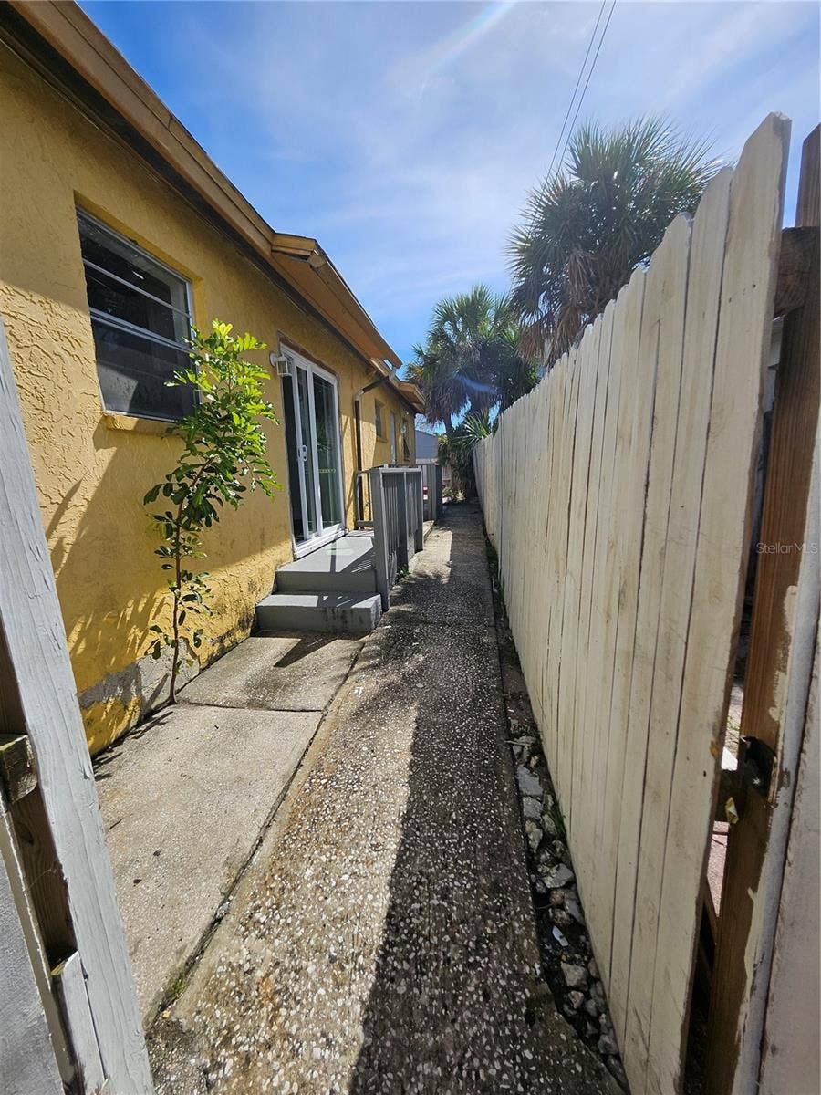 7840 BOCA CIEGA DRIVE, St Pete Beach, FL 33706 side exit off of the kitchen