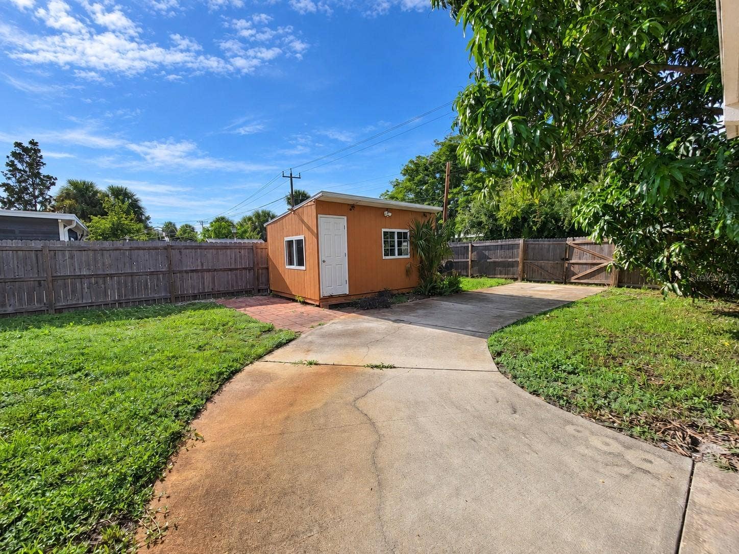 6711 DARTMOUTH AVENUE N, St Petersburg, FL 33710 Backyard w/Shed and Dbl Gate to alley access