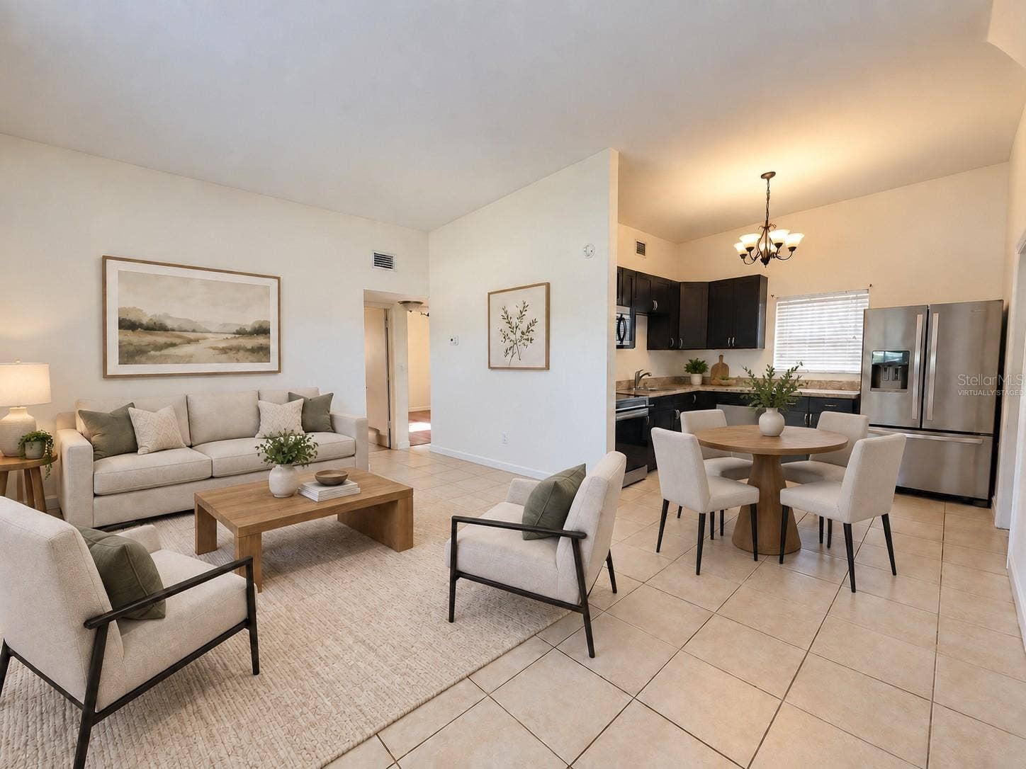 6711 DARTMOUTH AVENUE N, St Petersburg, FL 33710 Virtually staged LR/Kitchen