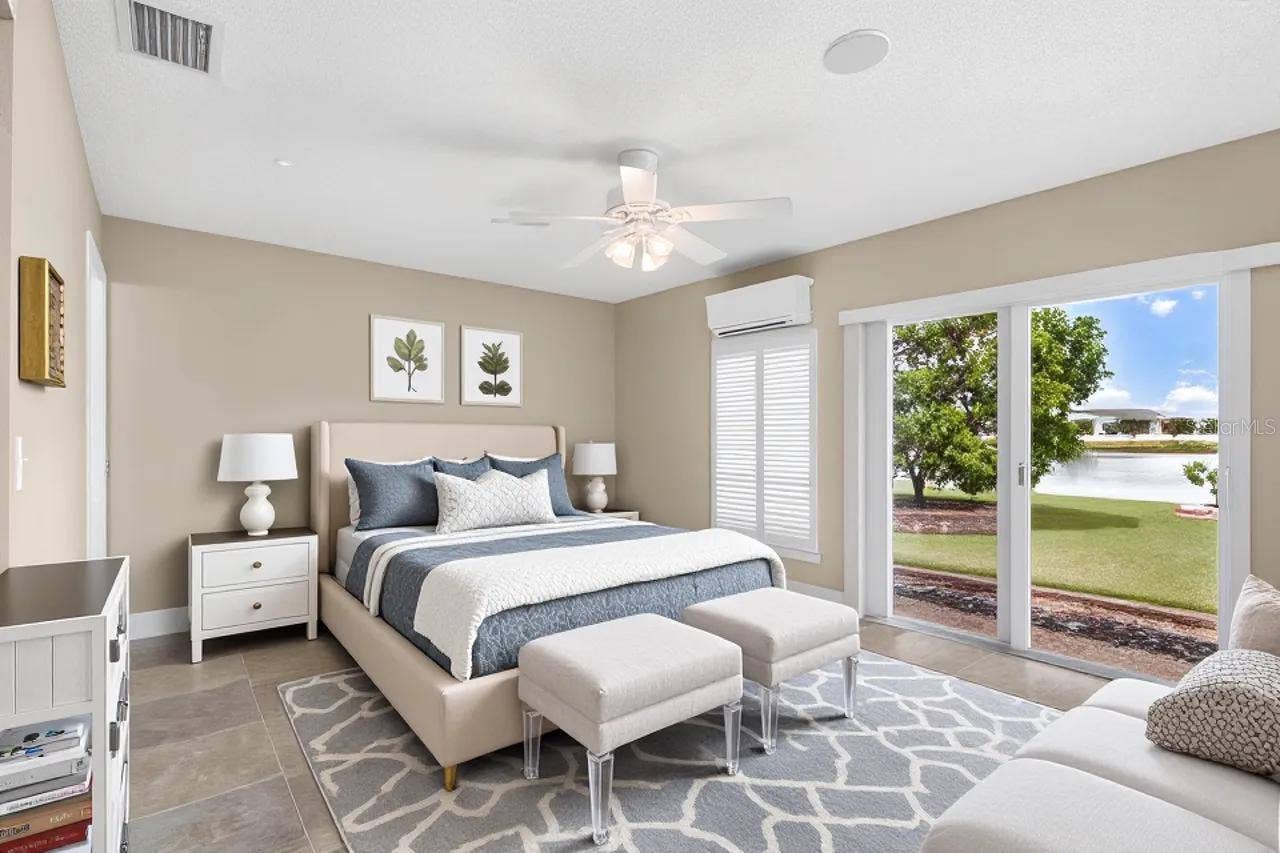 1519 FORT DUQUESNA DRIVE, Sun City Center, FL 33573 Staged Primary bedroom suite with energy saving split A.C. unit
