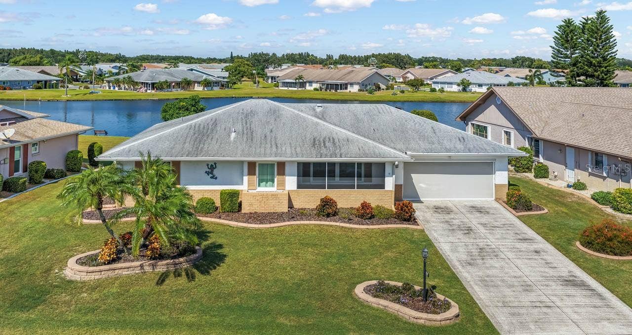 1519 FORT DUQUESNA DRIVE, Sun City Center, FL 33573 Lovely curbing and landscaping