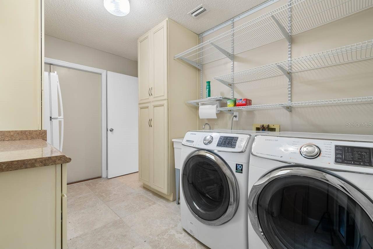1519 FORT DUQUESNA DRIVE, Sun City Center, FL 33573 Washer dryer includedLots of storage