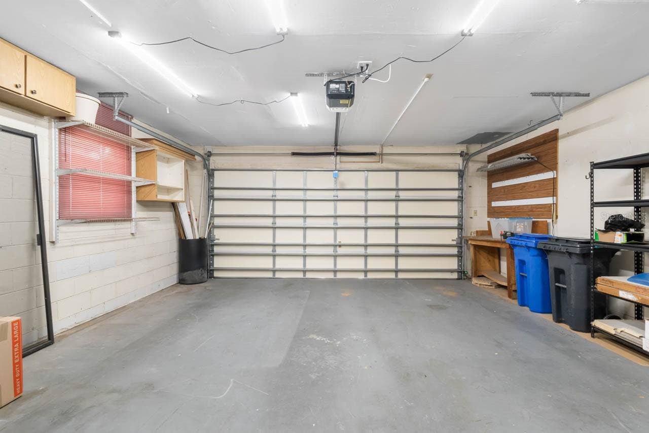 1519 FORT DUQUESNA DRIVE, Sun City Center, FL 33573 1.5 car garage with new door and opener