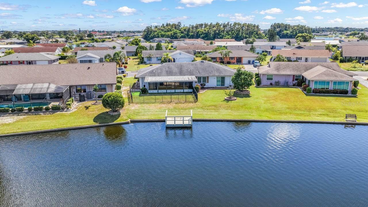 1519 FORT DUQUESNA DRIVE, Sun City Center, FL 33573 Fenced yard with doggy door access