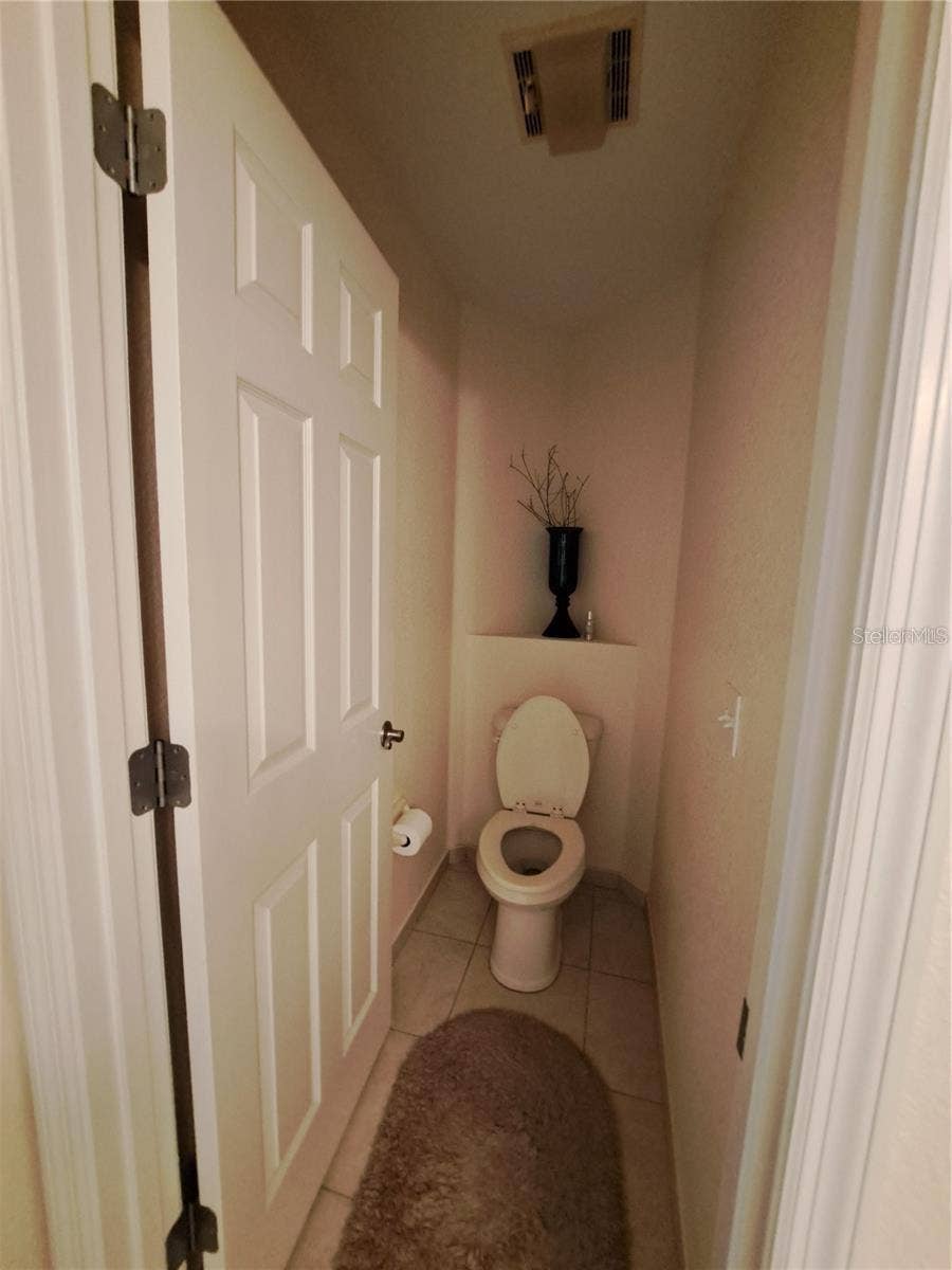5316 LOCHMEAD TERRACE, Zephyrhills, FL 33541 master bath toilet room