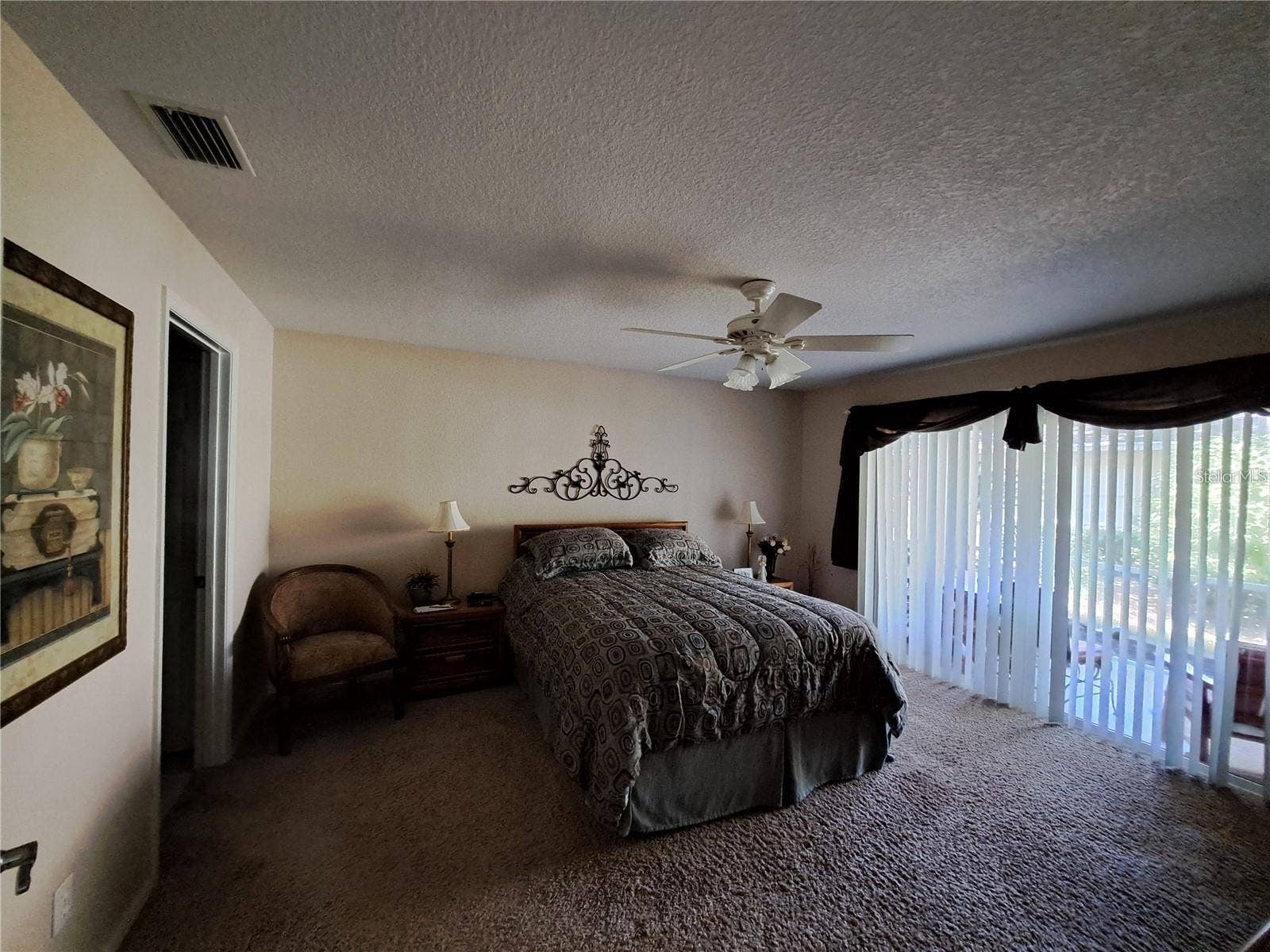 5316 LOCHMEAD TERRACE, Zephyrhills, FL 33541 Master with new double glass hurricane protected sliding doors to back screened porch