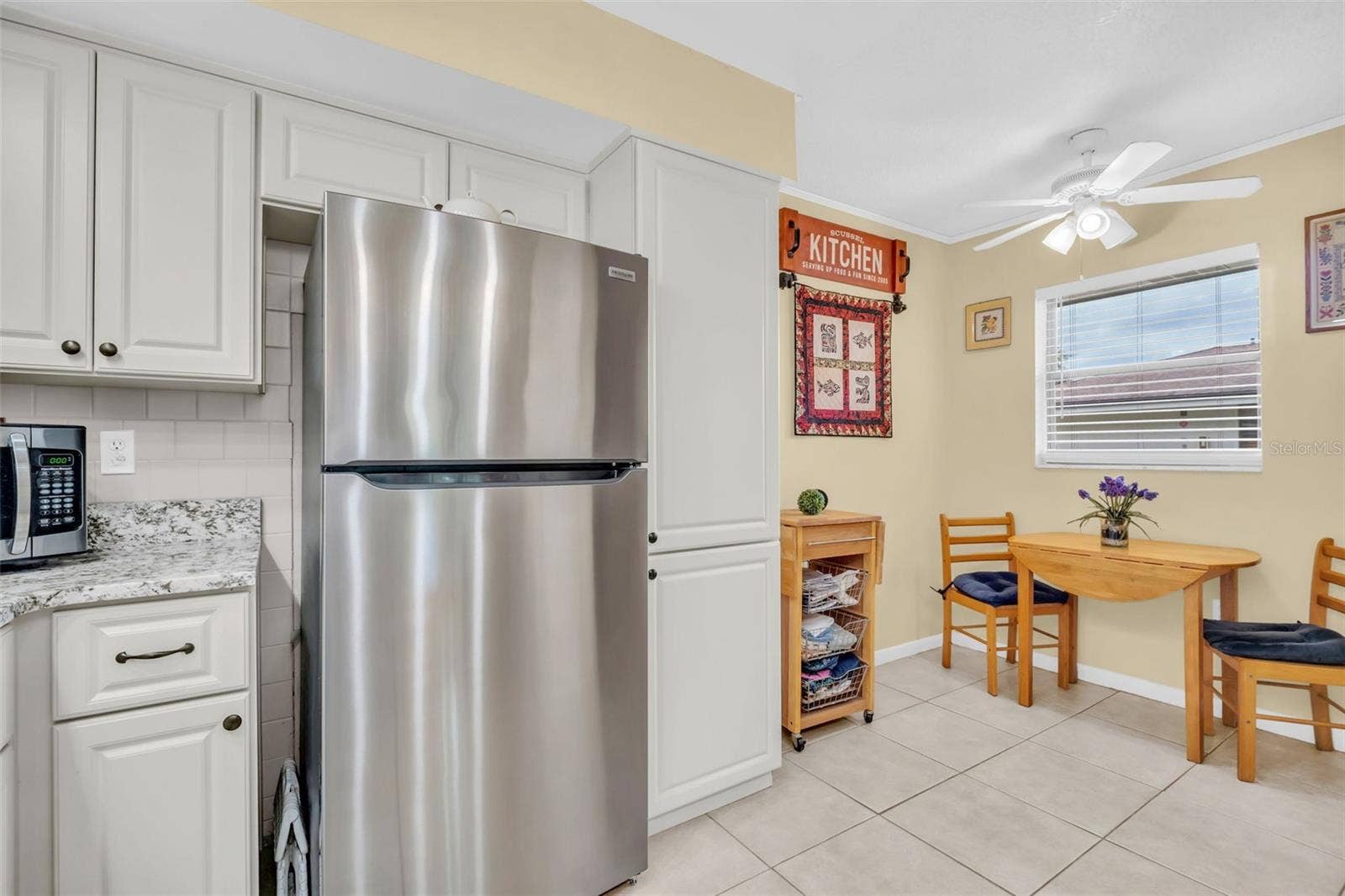 Sleek stainless refrigerator, microwave, and dishwasher~