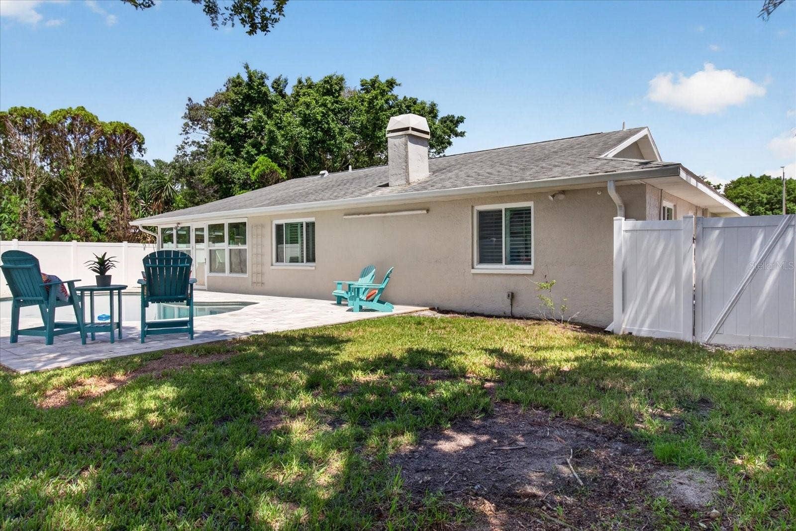 3350 HUNT CLUB DRIVE, Clearwater, FL 33761 Pull Down Movie Screen Located on the Wall