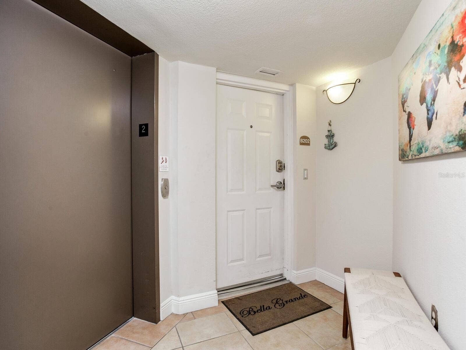5353 GULF BOULEVARD, #B202, St Pete Beach, FL 33706 Elevator Opens to Semi Private Foyer