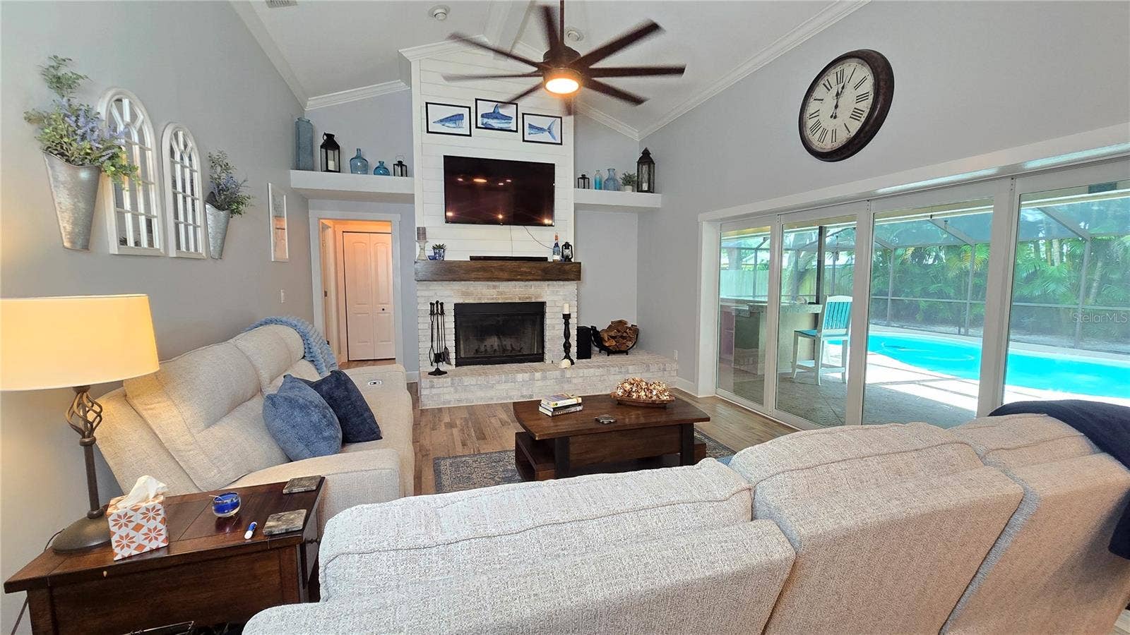 9991 WINDTREE BOULEVARD, Seminole, FL 33772 Wood burning fireplace located in the Family Room. Last year (Nov 2025) owners said they had the fireplace cleaned professionally