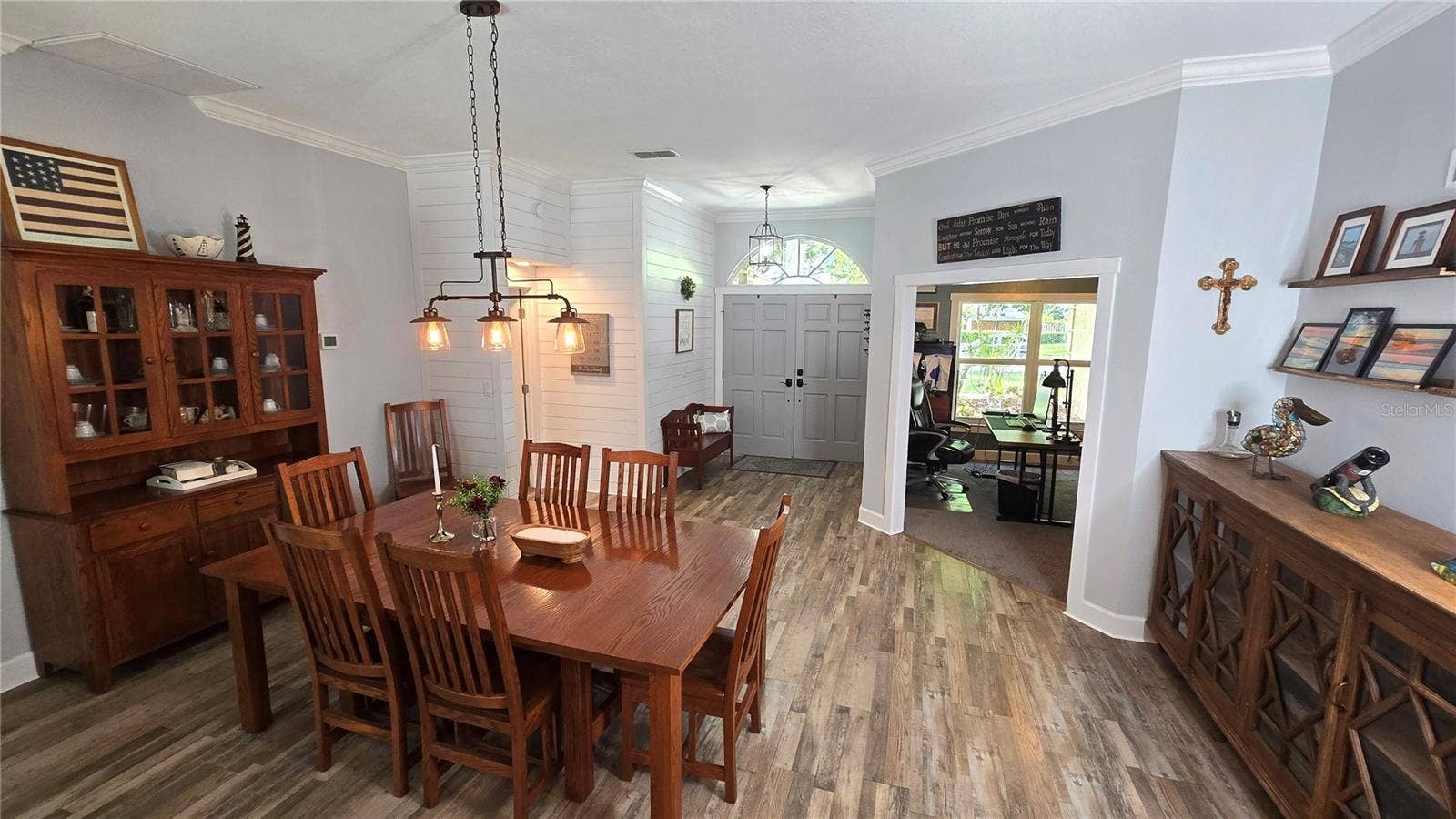 9991 WINDTREE BOULEVARD, Seminole, FL 33772 This view is from the back of the dining room facing the front entry door as well as the front office space.