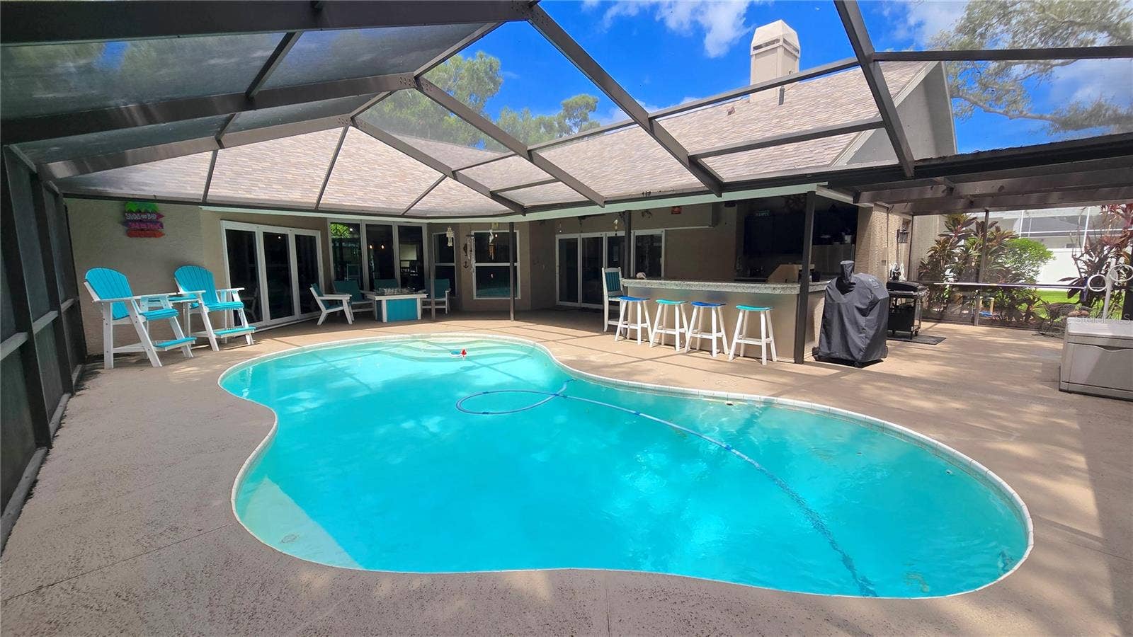 9991 WINDTREE BOULEVARD, Seminole, FL 33772 Entertainment galore right here around the pool, bar under the screened patio lanai. This right here is what Florida is all about. Now make this yours!