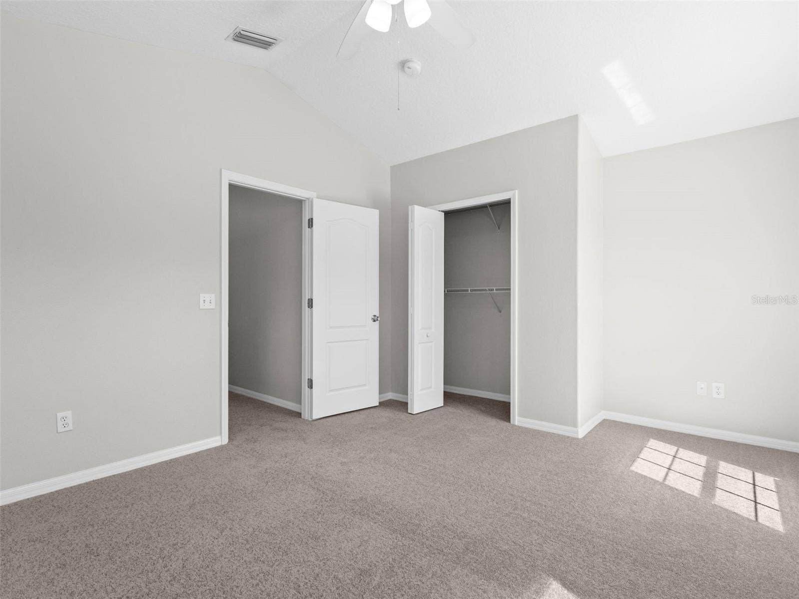 17912 HAVENVIEW LANE, Lutz, FL 33558 Upstairs bedroom with vaulted ceiling