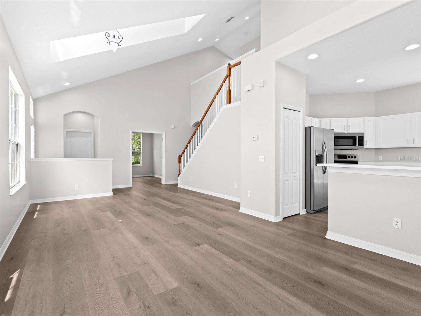 17912 HAVENVIEW LANE, Lutz, FL 33558 Living room and Dining room open to kitchen