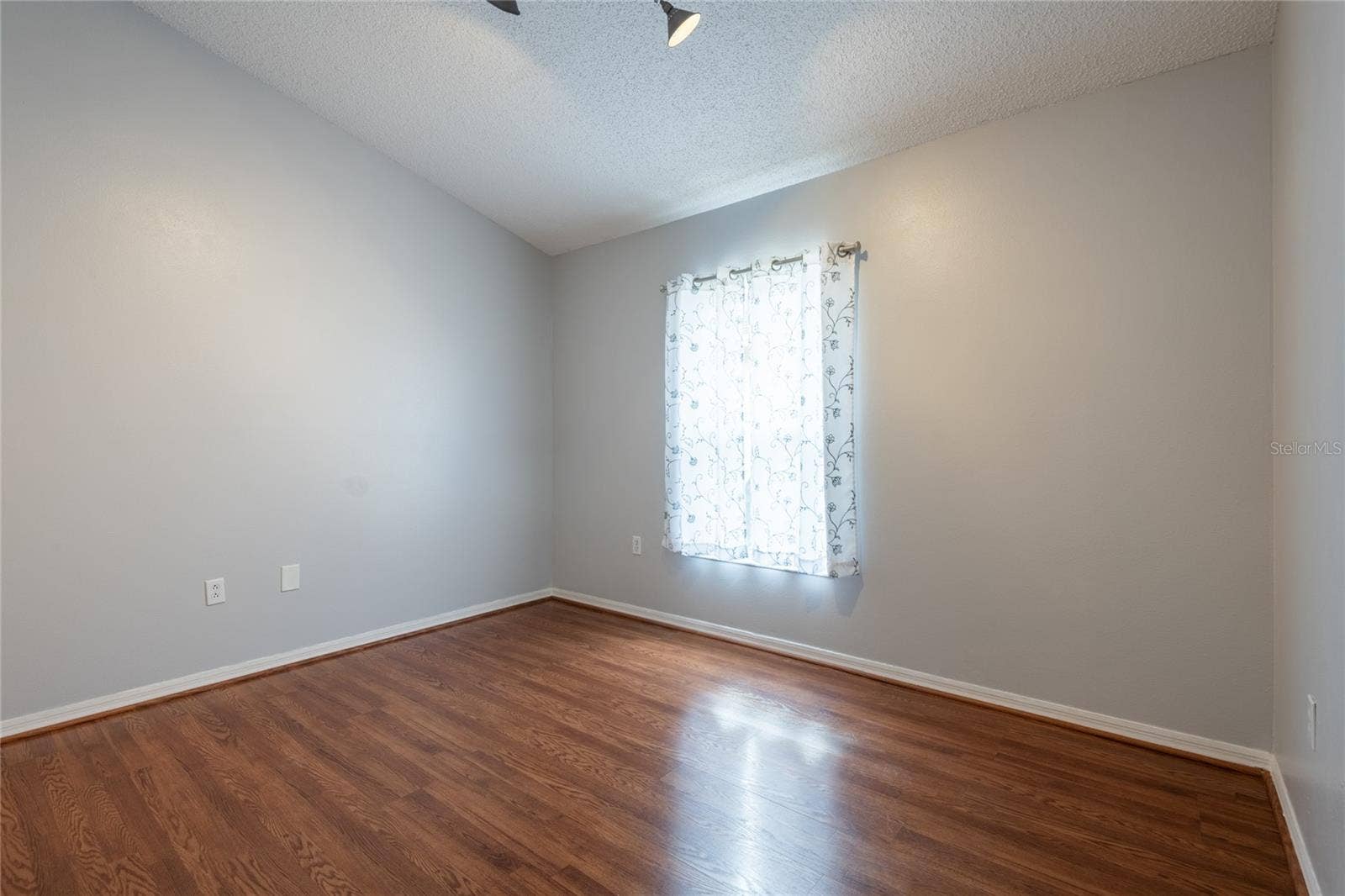 3rd bedroom with vaulted ceiling