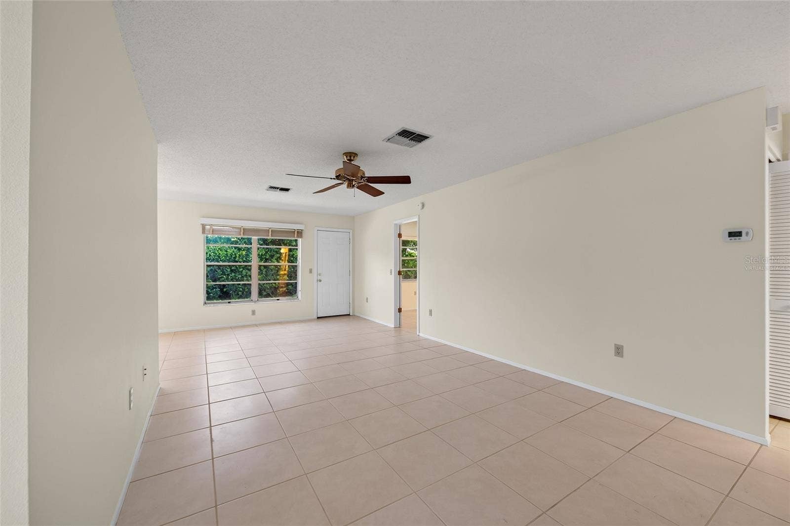 9545 DANVILLE COURT, #42, New Port Richey, FL 34655 Virtually Staged Living Room- 9545 Danville Court, #42, New Port Richey, FL 34655Wedgewood Village Condos in Heritage Lake