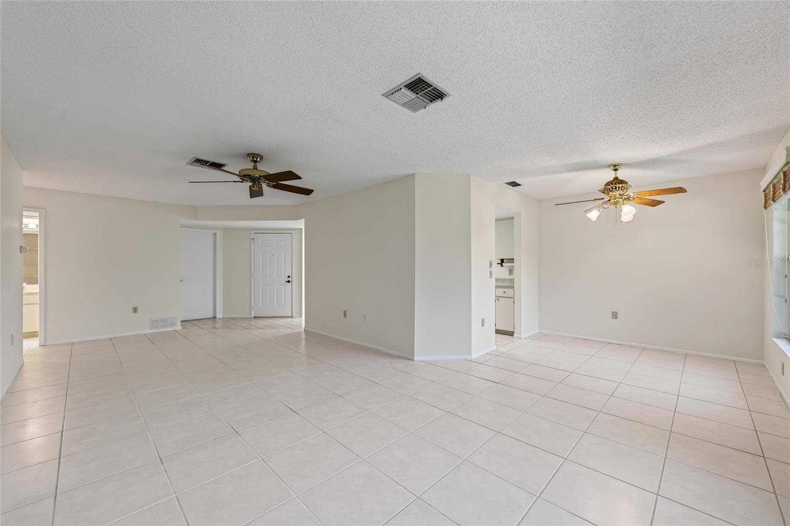 9545 DANVILLE COURT, #42, New Port Richey, FL 34655 Dining/Living Area- 9545 Danville Court, #42, New Port Richey, FL 34655Wedgewood Village Condos in Heritage Lake