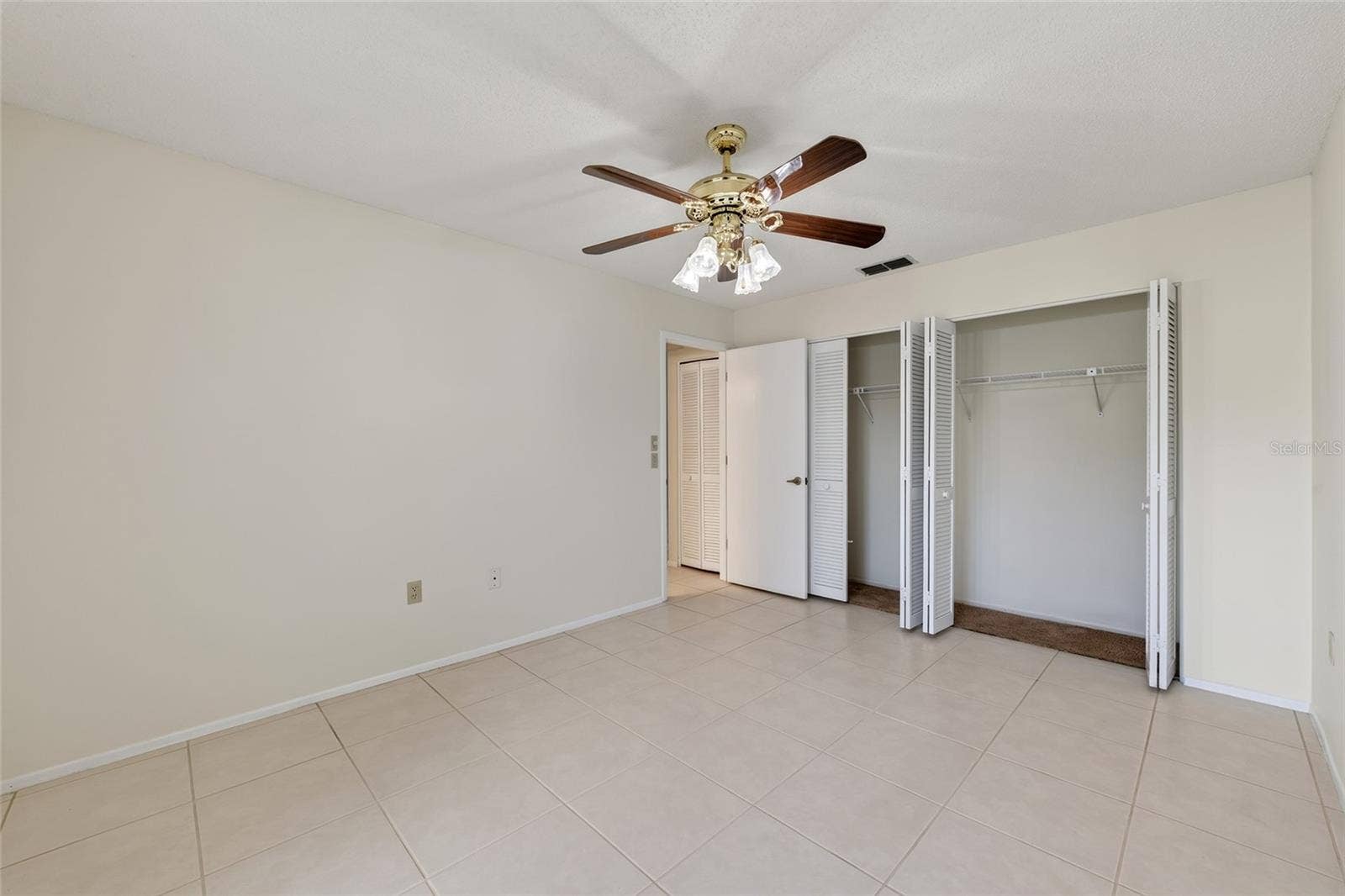 9545 DANVILLE COURT, #42, New Port Richey, FL 34655 Front Bedroom- 9545 Danville Court, #42, New Port Richey, FL 34655Wedgewood Village Condos in Heritage Lake