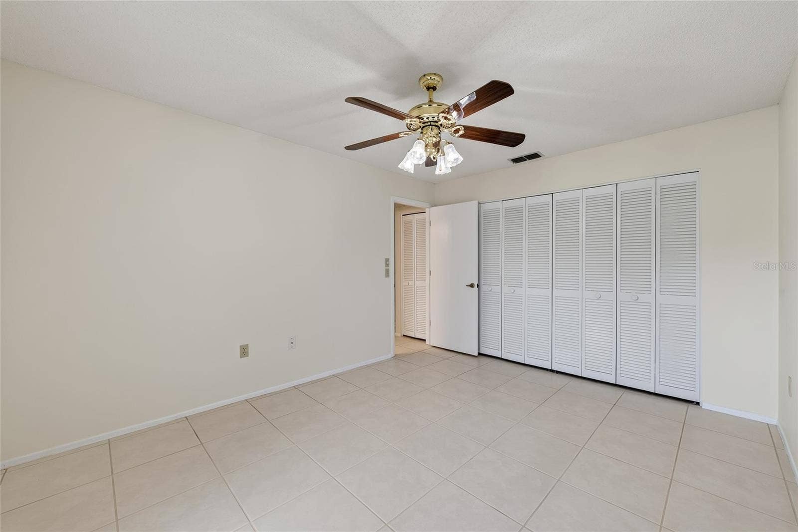 9545 DANVILLE COURT, #42, New Port Richey, FL 34655 Front Bedroom- 9545 Danville Court, #42, New Port Richey, FL 34655Wedgewood Village Condos in Heritage Lake