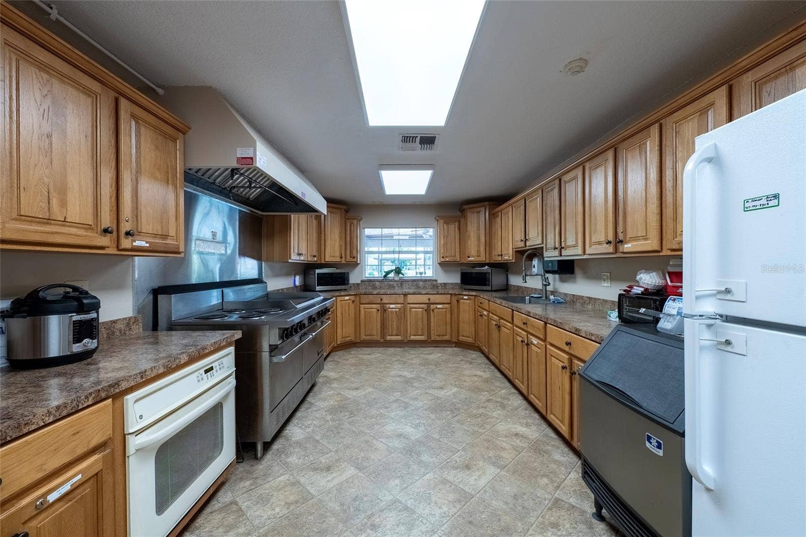 9545 DANVILLE COURT, #42, New Port Richey, FL 34655 Heritage Lake Community Kitchen in Clubhouse