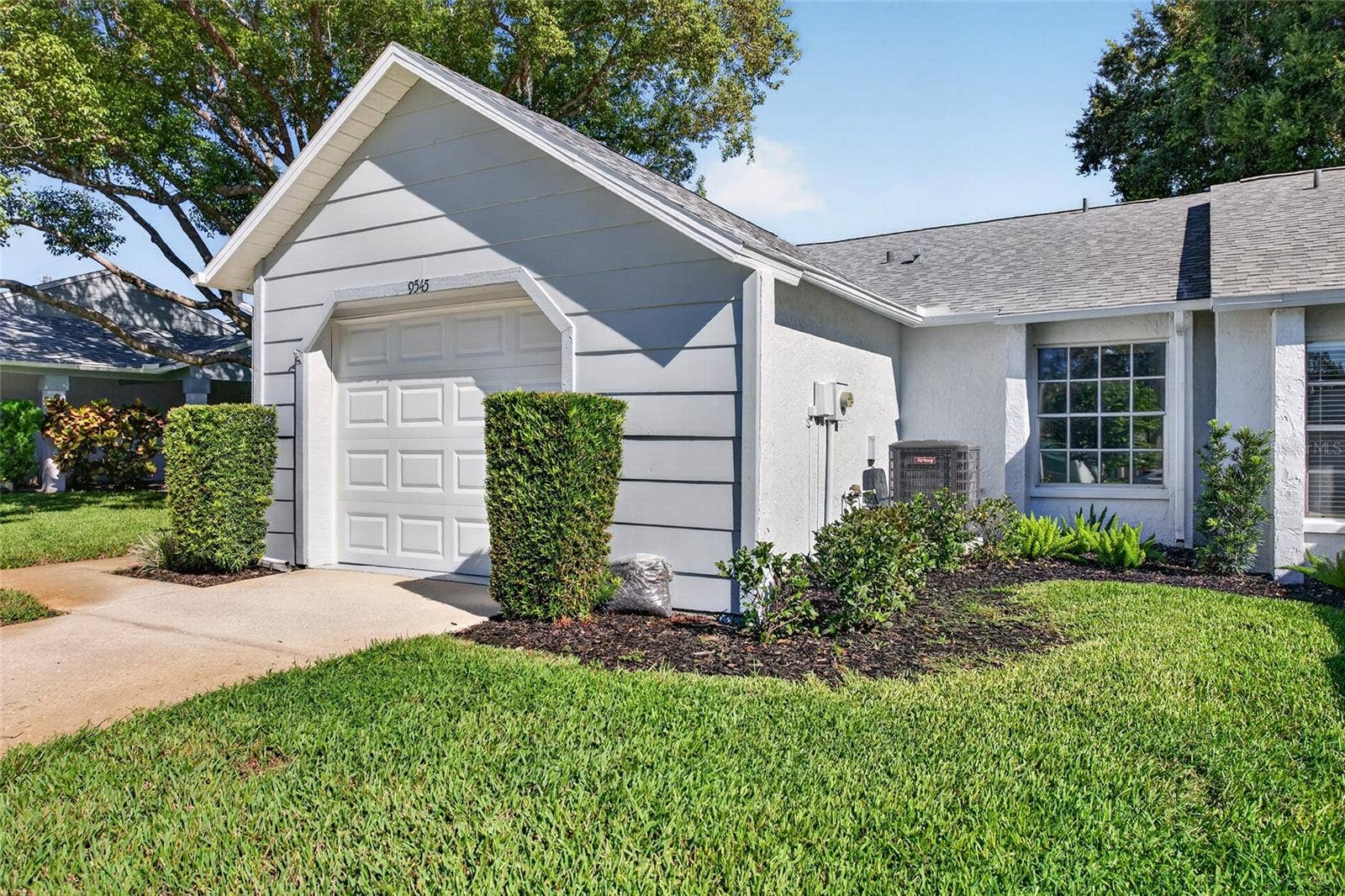 9545 DANVILLE COURT, #42, New Port Richey, FL 34655 Front View- 9545 Danville Court, #42, New Port Richey, FL 34655Wedgewood Village Condos in Heritage Lake