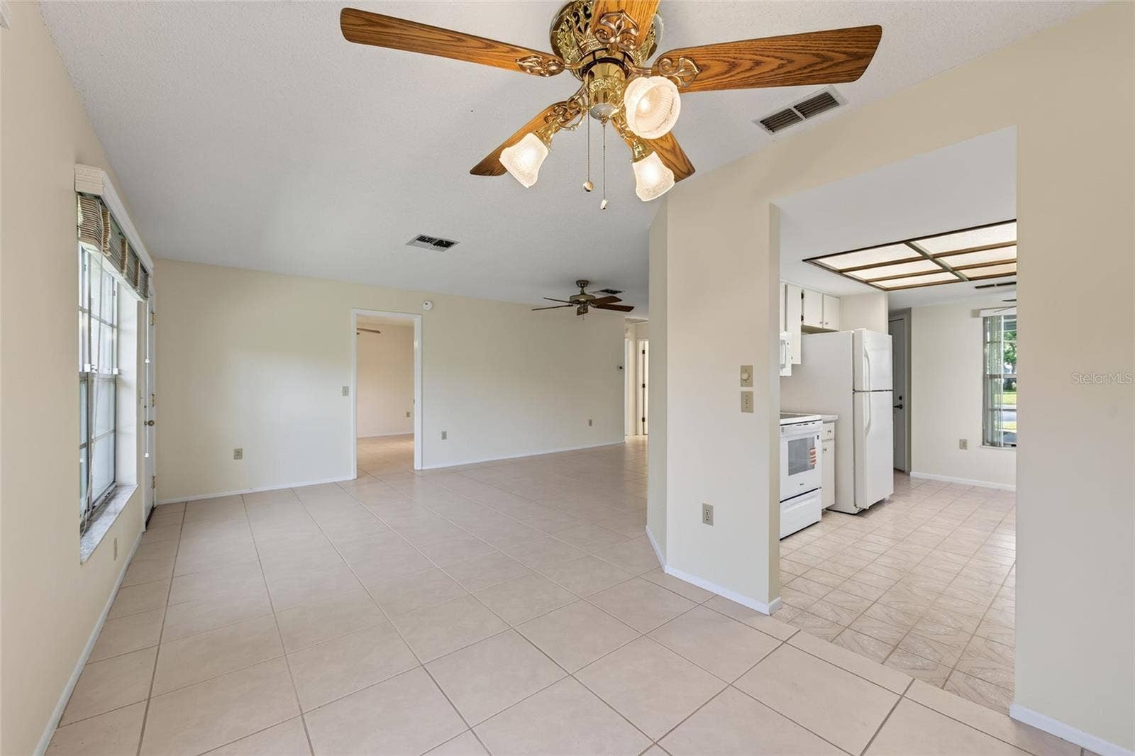 9545 DANVILLE COURT, #42, New Port Richey, FL 34655 Dining/Living Area- 9545 Danville Court, #42, New Port Richey, FL 34655Wedgewood Village Condos in Heritage Lake