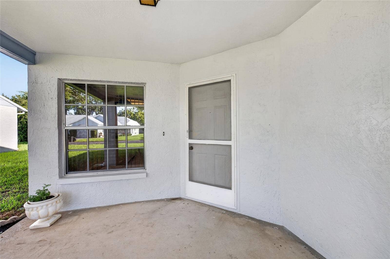 9545 DANVILLE COURT, #42, New Port Richey, FL 34655 Entrance/Covered Porch- 9545 Danville Court, #42, New Port Richey, FL 34655Wedgewood Village Condos in Heritage Lake