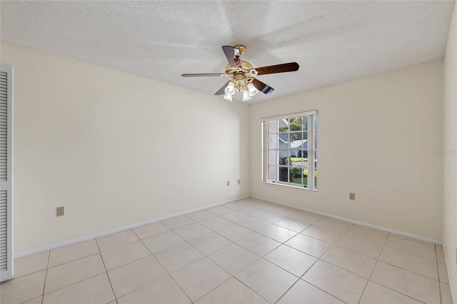 9545 DANVILLE COURT, #42, New Port Richey, FL 34655 Front Bedroom- 9545 Danville Court, #42, New Port Richey, FL 34655Wedgewood Village Condos in Heritage Lake