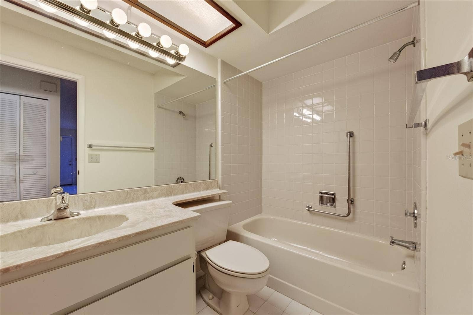 9545 DANVILLE COURT, #42, New Port Richey, FL 34655 Front Bathroom- 9545 Danville Court, #42, New Port Richey, FL 34655Wedgewood Village Condos in Heritage Lake