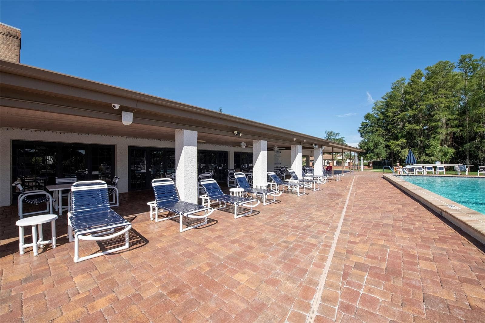9545 DANVILLE COURT, #42, New Port Richey, FL 34655 Heritage Lake Covered Patio Area at Swimming Pool