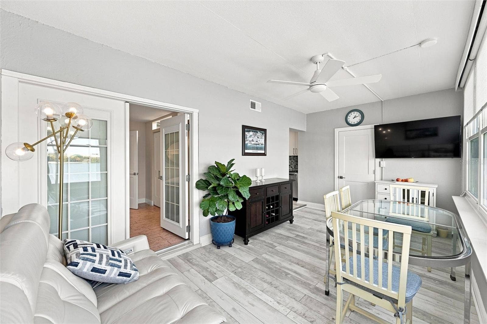1898 SHORE DRIVE S, #208, South Pasadena, FL 33707 The family room, looking in from the waterfront view!