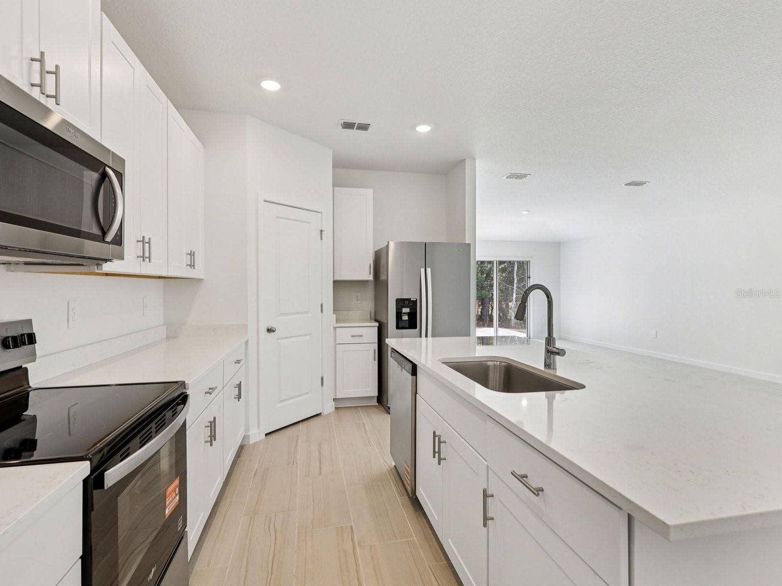 124 WANDERING CREEK WAY, Palm Coast, FL 32164 Photo is not of the actual home, but is an inspirational photo of builders model home and may depict options, furnishings, and/or decorator features that are not included