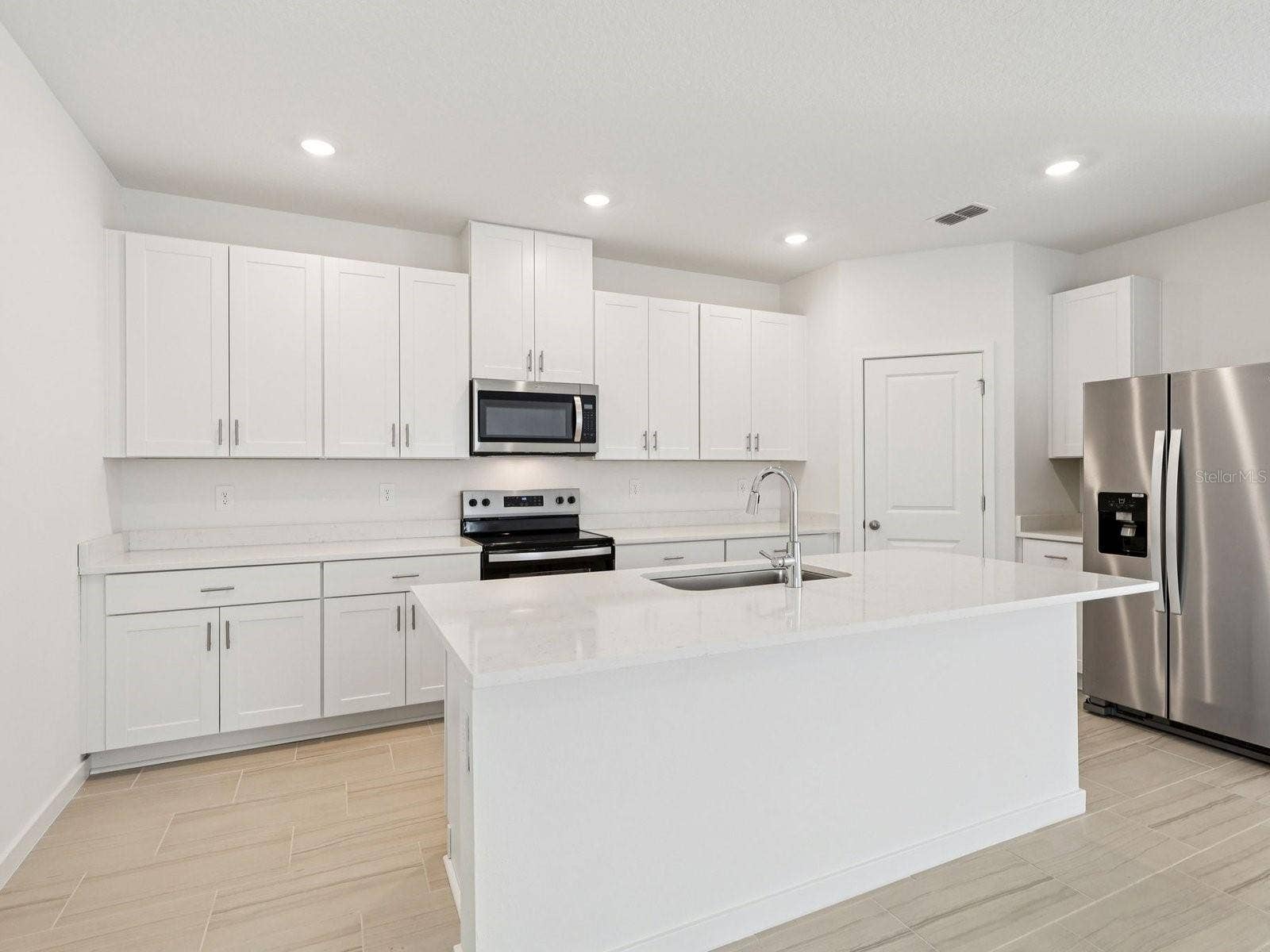 124 WANDERING CREEK WAY, Palm Coast, FL 32164 Photo is not of the actual home, but is an inspirational photo of builders model home and may depict options, furnishings, and/or decorator features that are not included