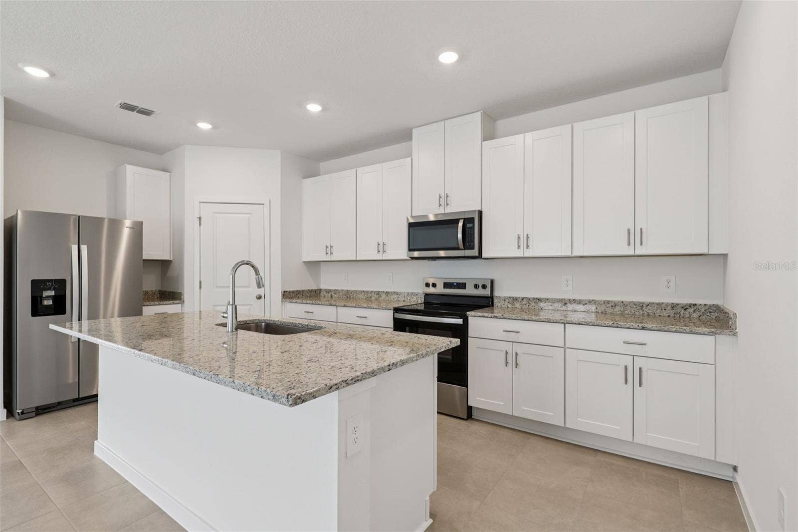 126 WANDERING CREEK WAY, Palm Coast, FL 32164 Photo is not of the actual home, but is an inspirational photo of builders model home and may depict options, furnishings, and/or decorator features that are not included