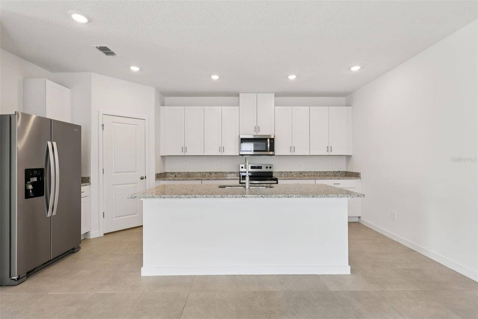 126 WANDERING CREEK WAY, Palm Coast, FL 32164 Photo is not of the actual home, but is an inspirational photo of builders model home and may depict options, furnishings, and/or decorator features that are not included