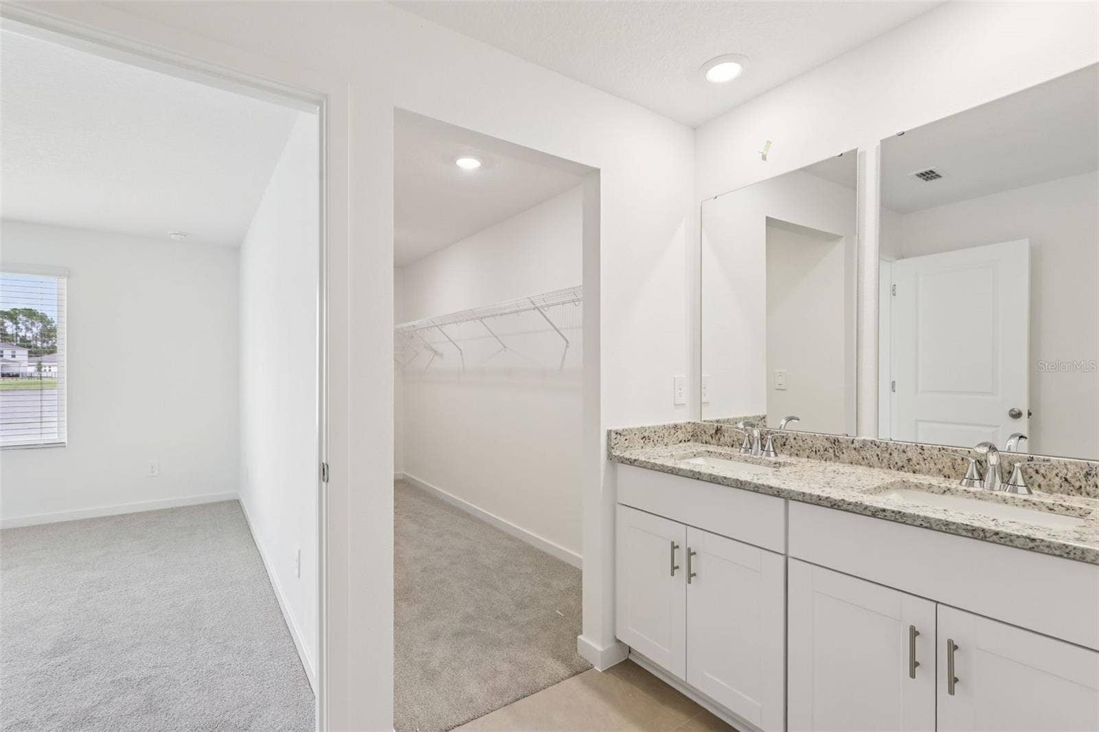 126 WANDERING CREEK WAY, Palm Coast, FL 32164 Photo is not of the actual home, but is an inspirational photo of builders model home and may depict options, furnishings, and/or decorator features that are not included