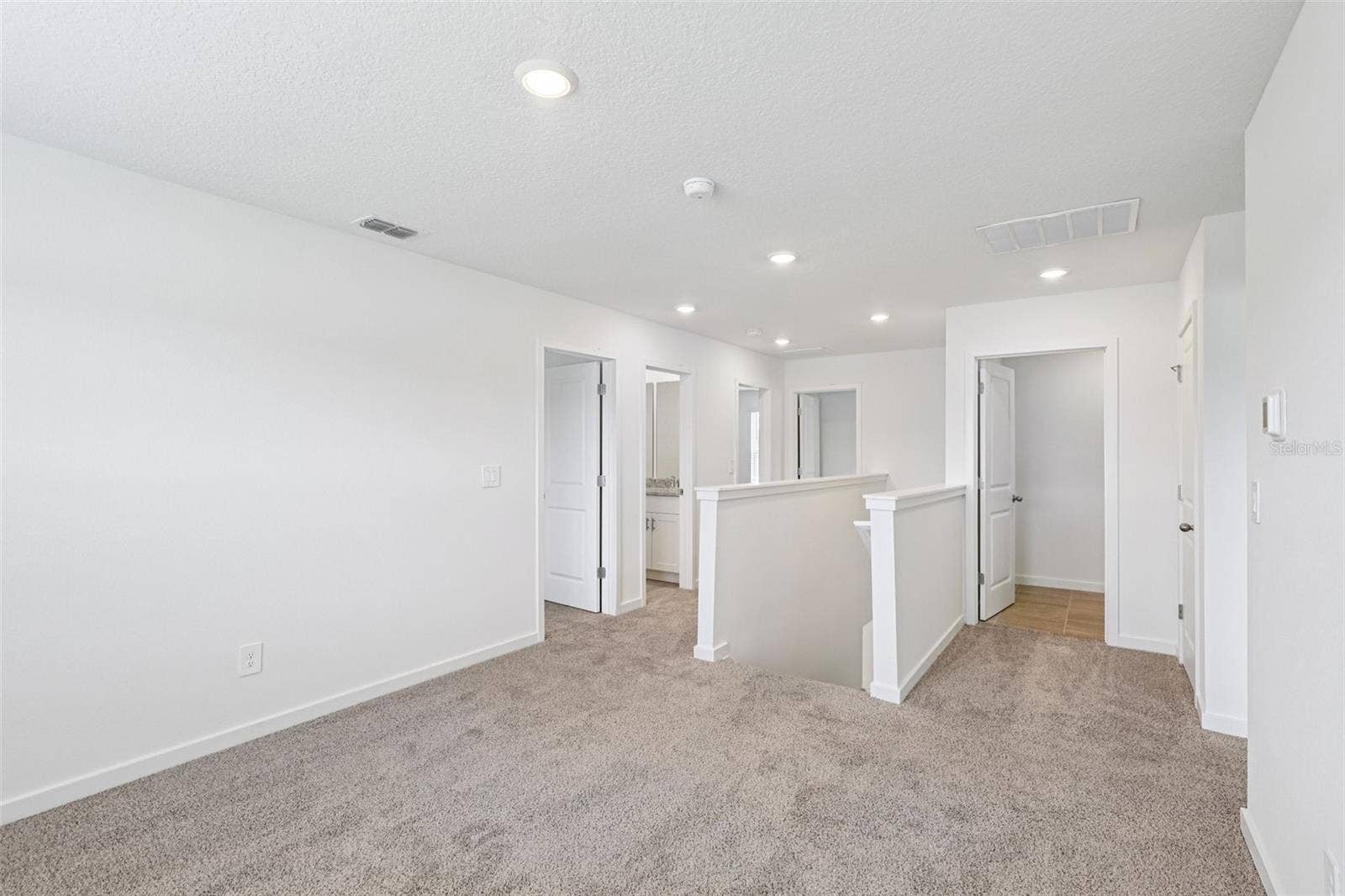 The interior photos are of another home with the same floor plan but different interior color package finishes. Some details may vary