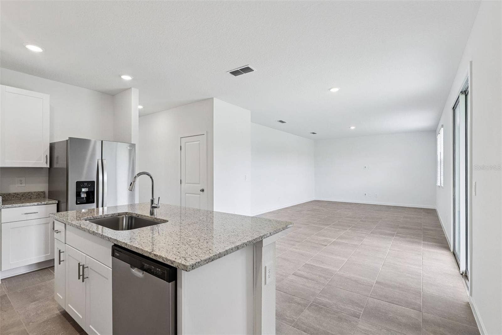 The interior photos are of another home with the same floor plan but different interior color package finishes. Some details may vary