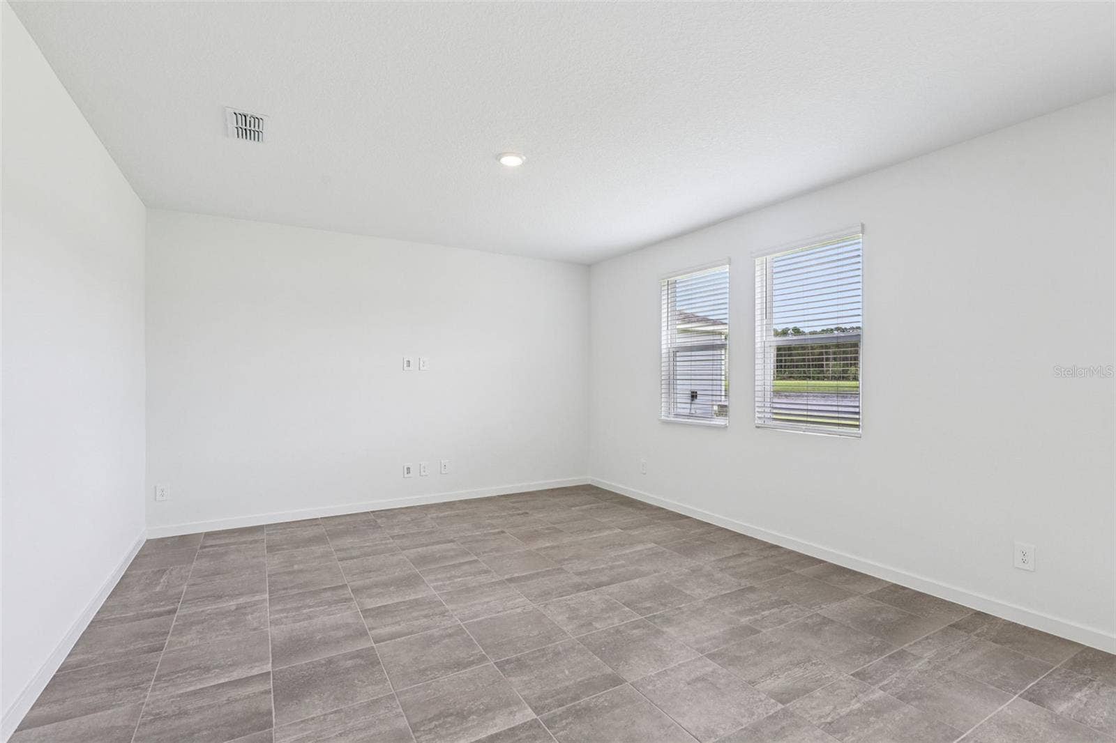 The interior photos are of another home with the same floor plan but different interior color package finishes. Some details may vary