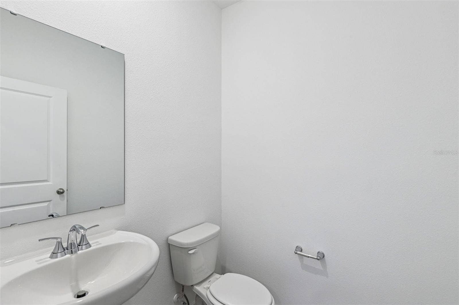 The interior photos are of another home with the same floor plan but different interior color package finishes. Some details may vary