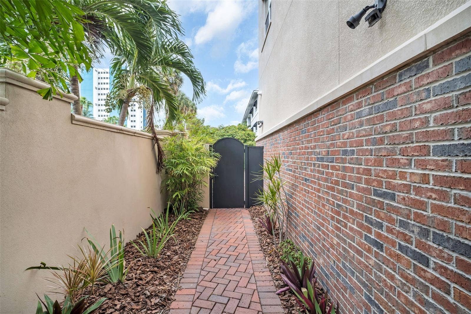 side secure gate by garage entry