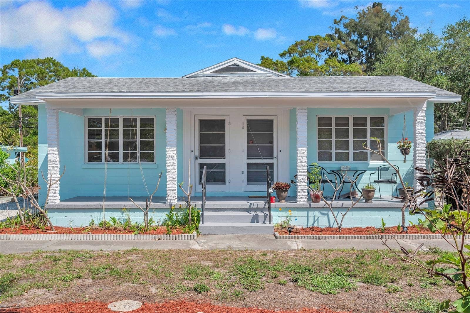 5025 28TH AVENUE S, Gulfport, FL 33707 5027 duplex - covered front porch with French-door entries