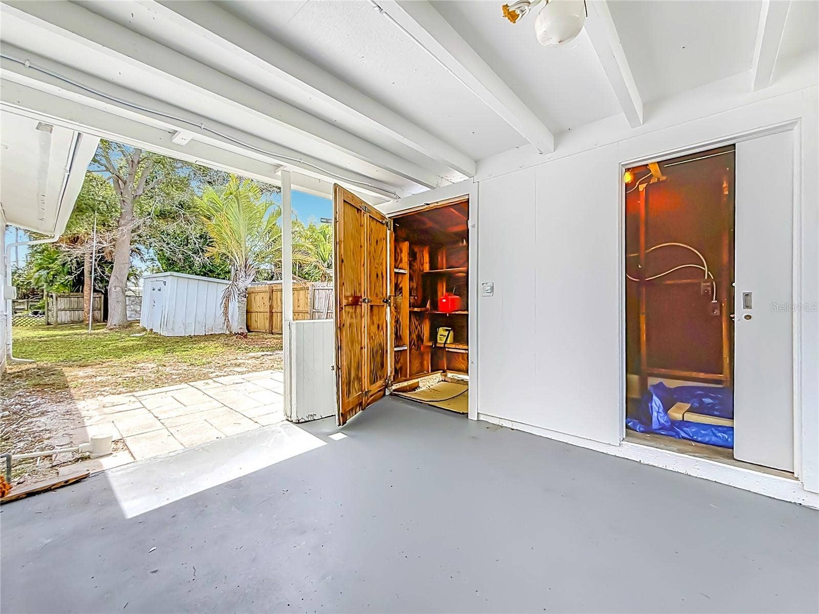 355 39TH AVENUE, St Pete Beach, FL 33706 Laundry & Storage in carport.