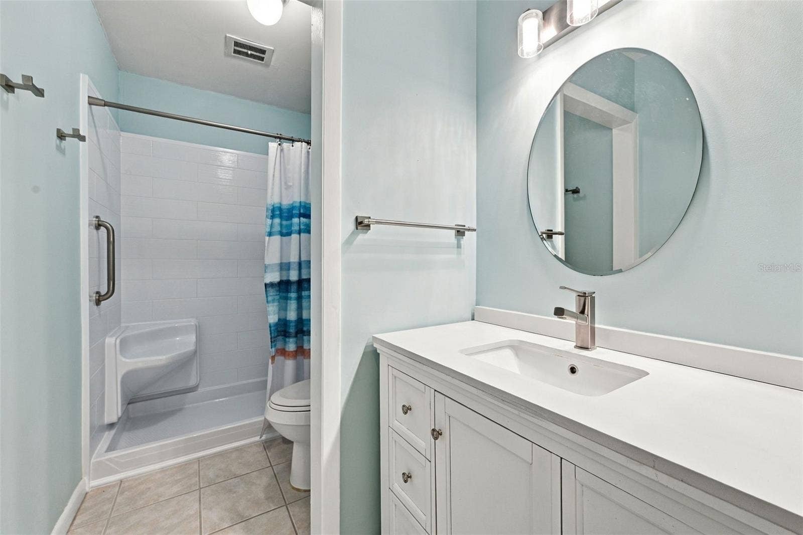 8353 CANDLEWOOD ROAD, Seminole, FL 33777 Updated Bath w/Walk-In Shower